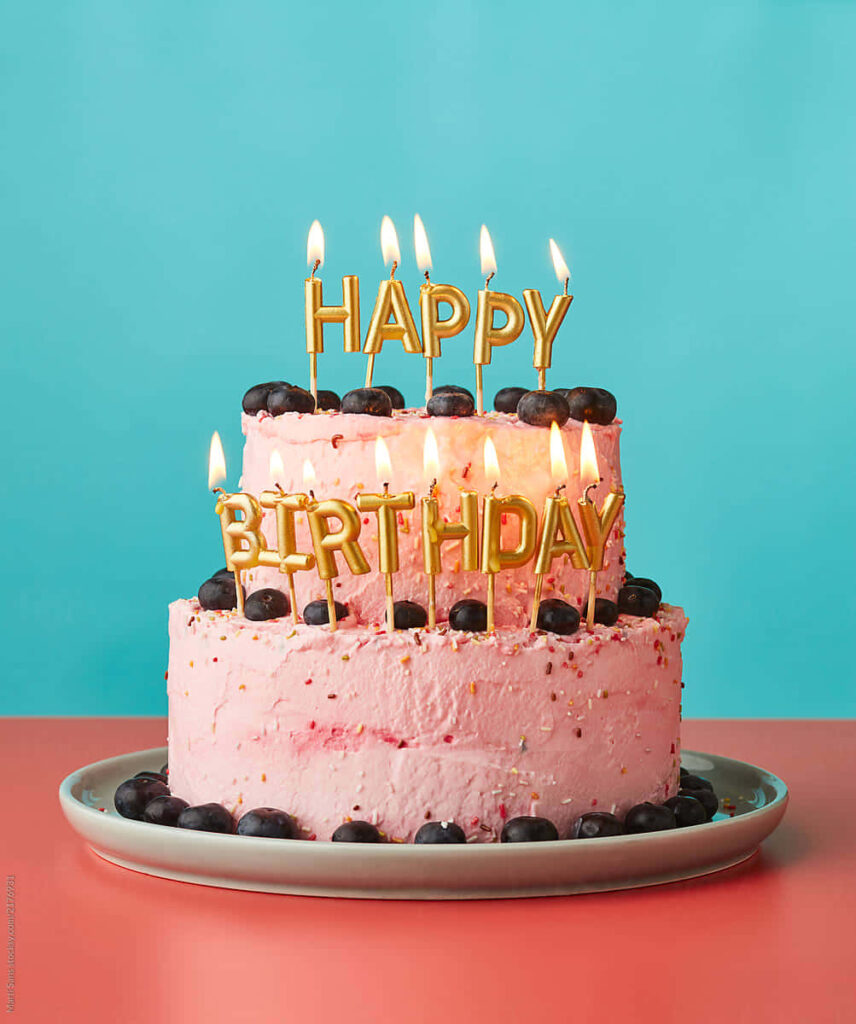 Vibrant Birthday Cake Wallpaper with Pink Frosting & Cheerful Backdrop