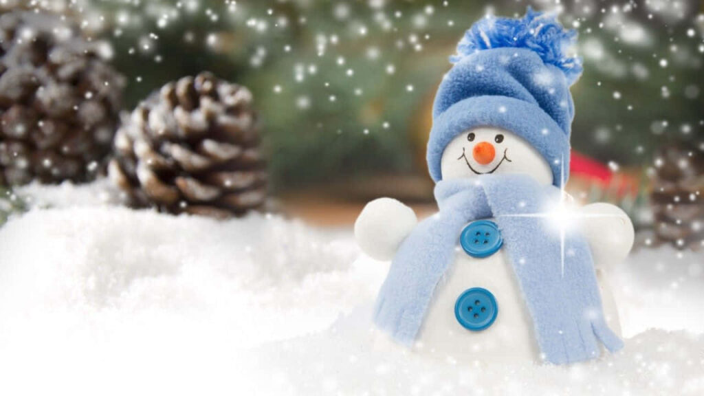 Cheerful Snowman Wallpaper: Cozy Holiday Background with Pine Cones
