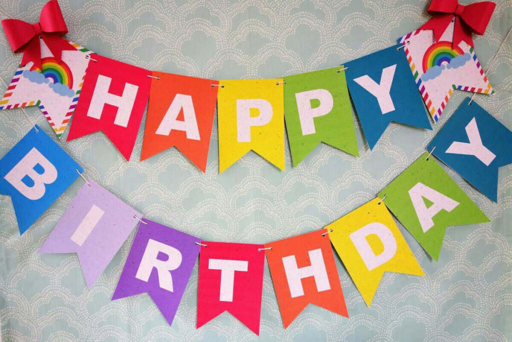 Vibrant DIY Birthday Banner with Colorful Flags for Festive Backdrop Wallpaper