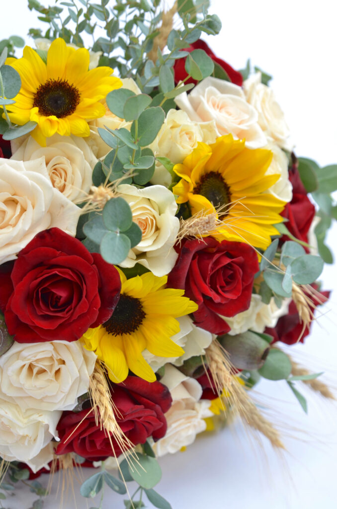 Elegant Floral Wallpaper: Sunflowers, Roses, Green Leaves Background