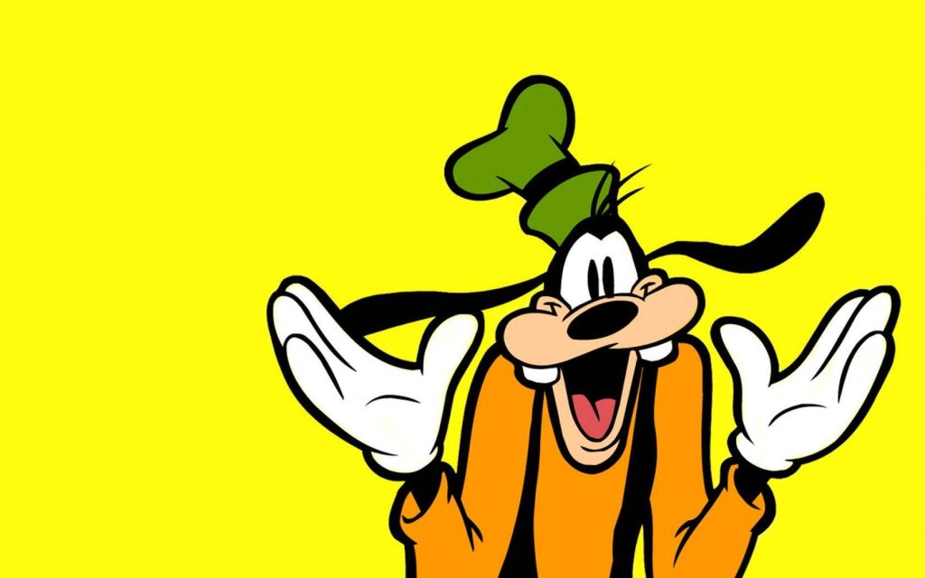 Goofy cartoon shrugging smiling on vibrant yellow Disney wallpaper background for fans
