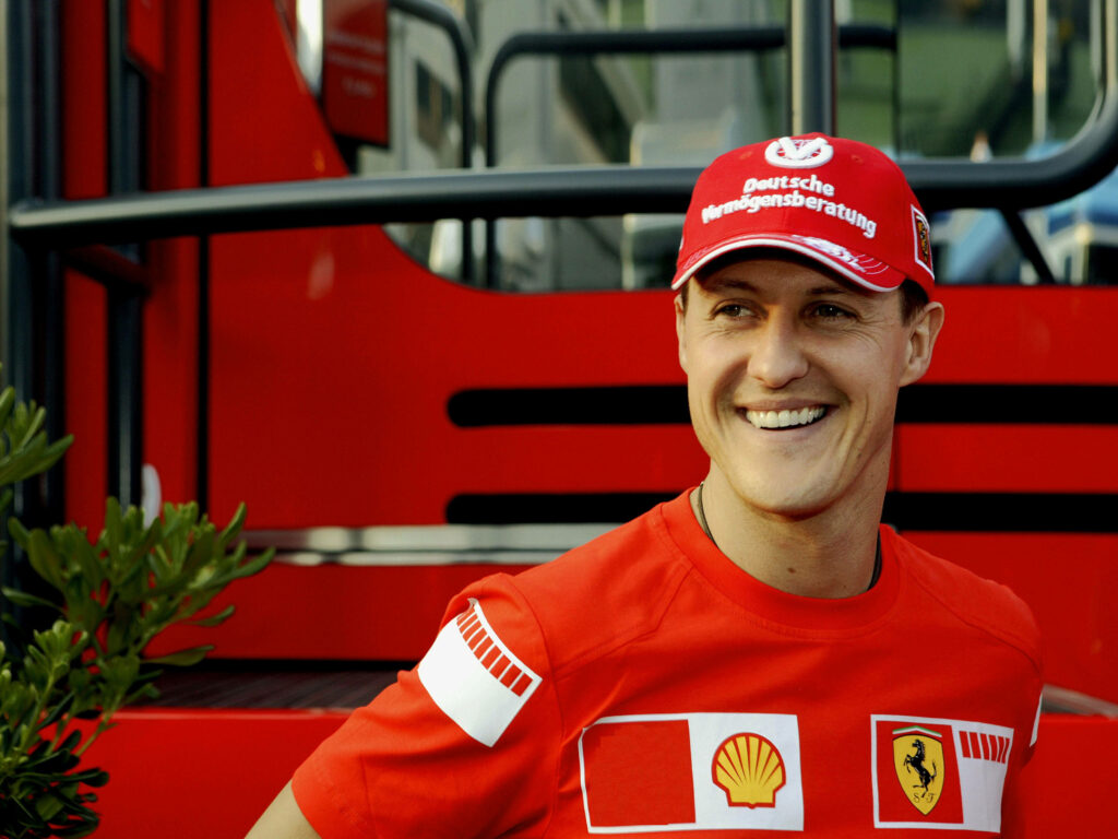 Cheerful Michael Schumacher Ferrari Wallpaper Background