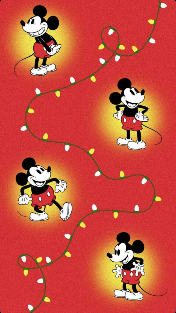 Festive Mickey Mouse Wallpaper with Christmas Lights on Red Background