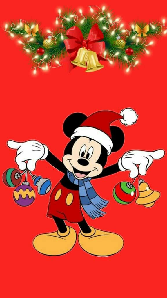 Cheerful Mickey Mouse Christmas Wallpaper with Santa Hat & Decor