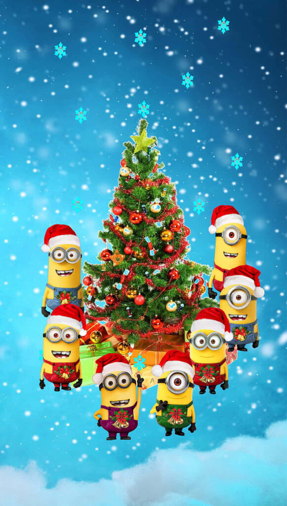 Joyful Minions Celebrate Christmas in Snowy Festive Wallpaper