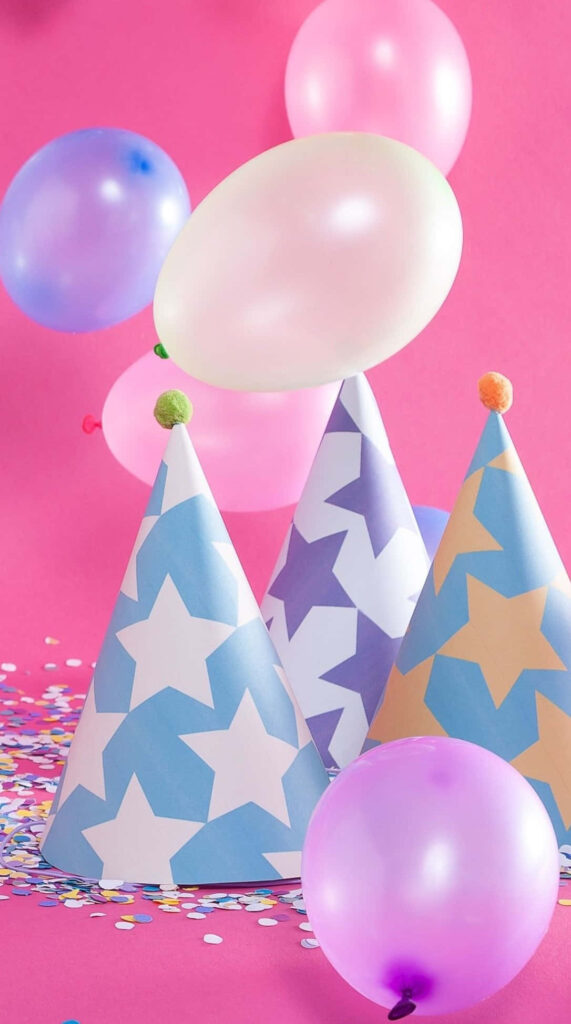 Vibrant Pink Birthday Wallpaper with Colorful Balloons & Party Hats