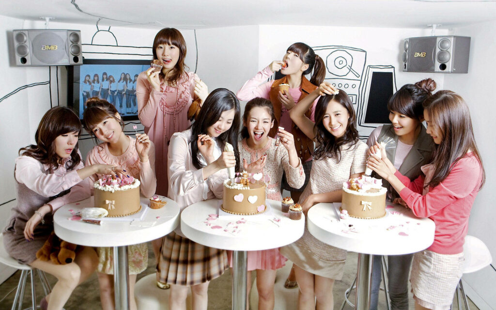 Cheerful SNSD Celebration Wallpaper: Festive Girls' Generation Background