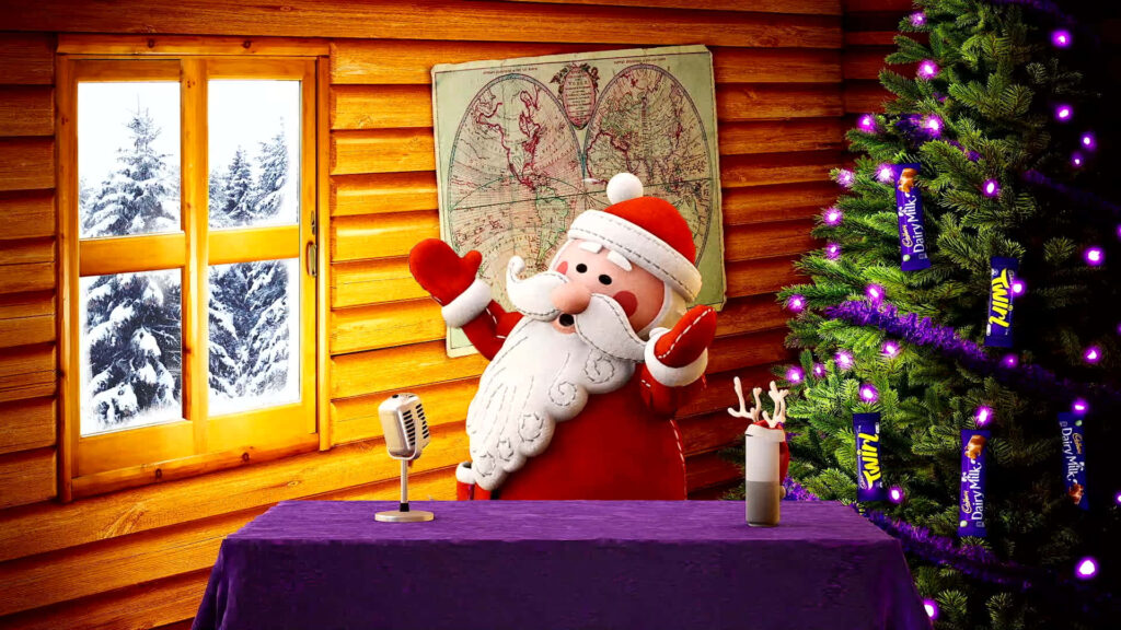 Festive Christmas Wallpaper: Cheerful Santa in Cozy Cabin Scene