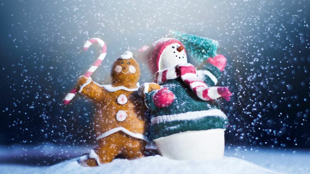 Cheerful Snowman & Gingerbread Cookie: Festive Holiday Wallpaper