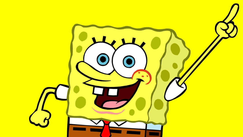 Cheerful SpongeBob Laptop Wallpaper on Bright Yellow Background