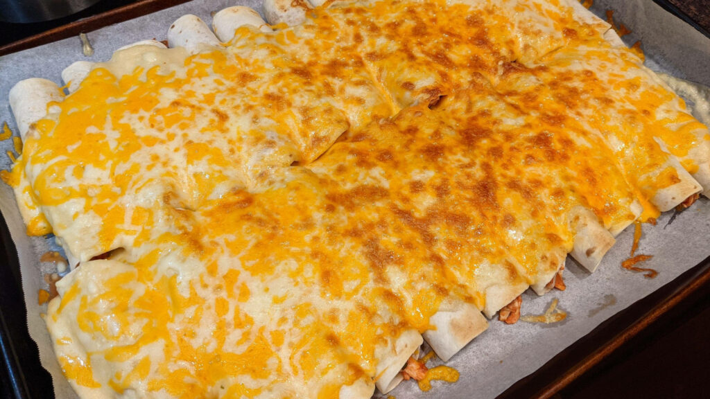 “Cheesy Enchiladas Wallpaper: A Savory Baked Delight”