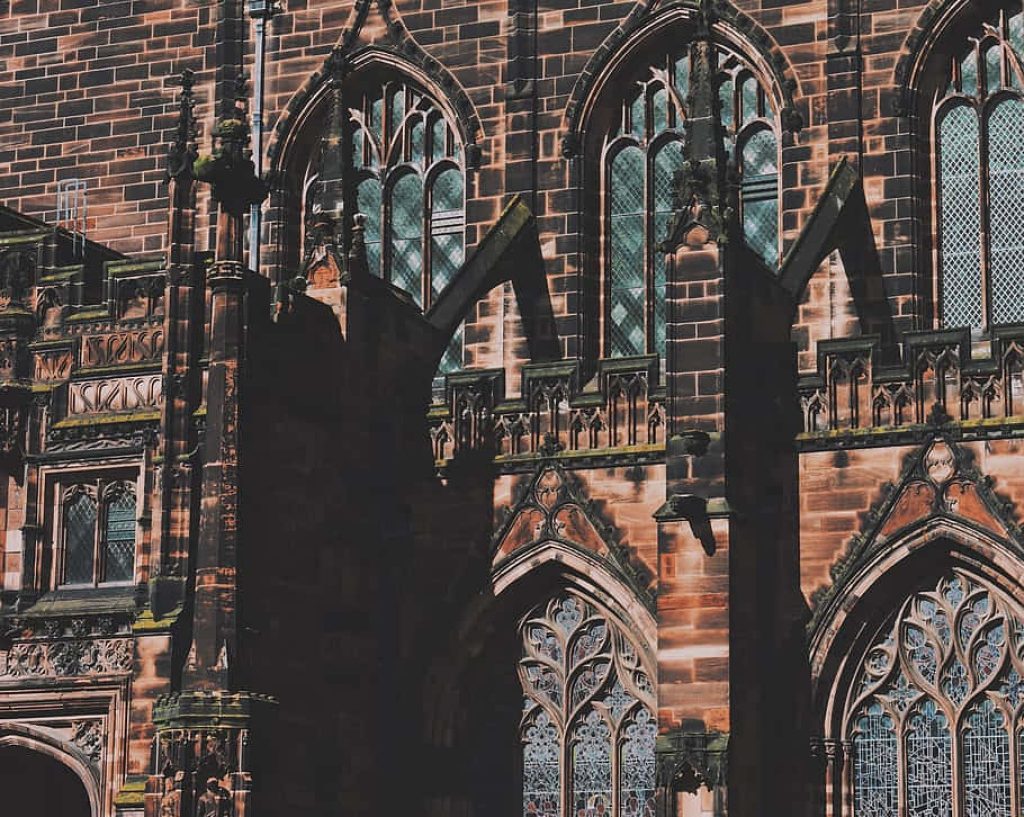 Close-up of Chester Cathedral Gothic architecture red sandstone intricate window tracery wallpaper