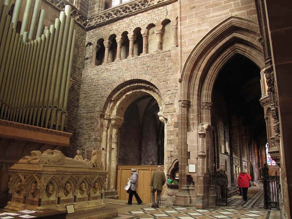Chester Cathedral interior with intricate stone architecture medieval tomb and grand pipe organ Wallpaper