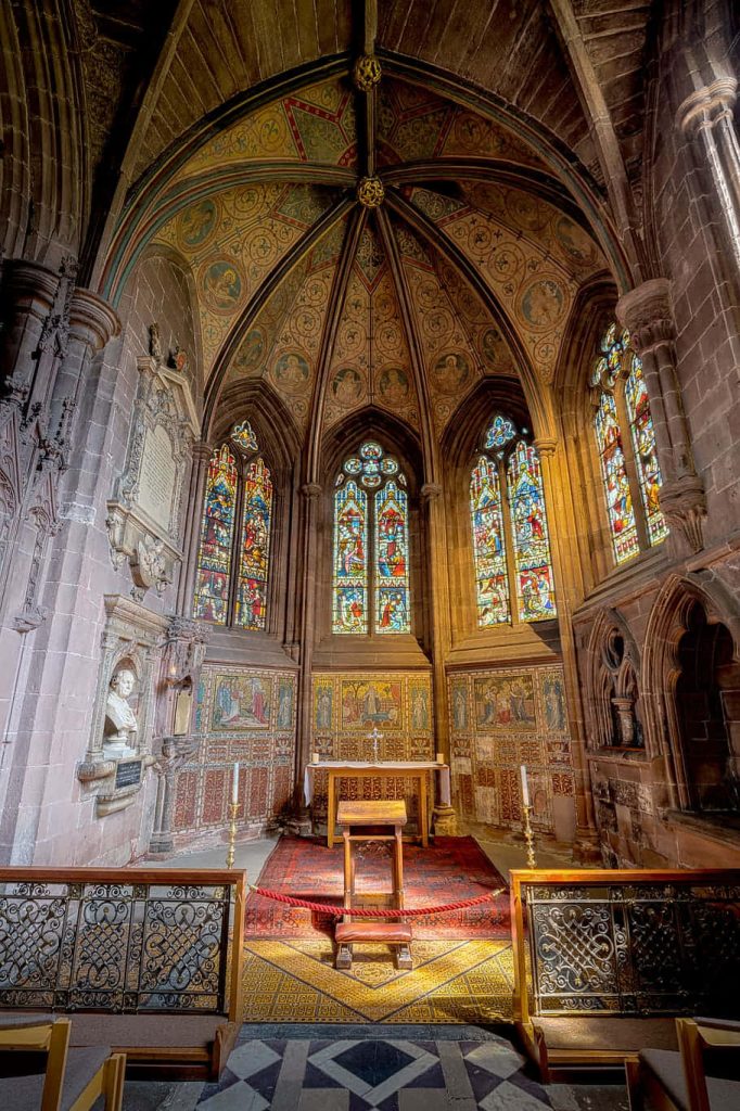 Chester Cathedral interior with vibrant stained glass vaulted ceiling Gothic architecture wallpaper