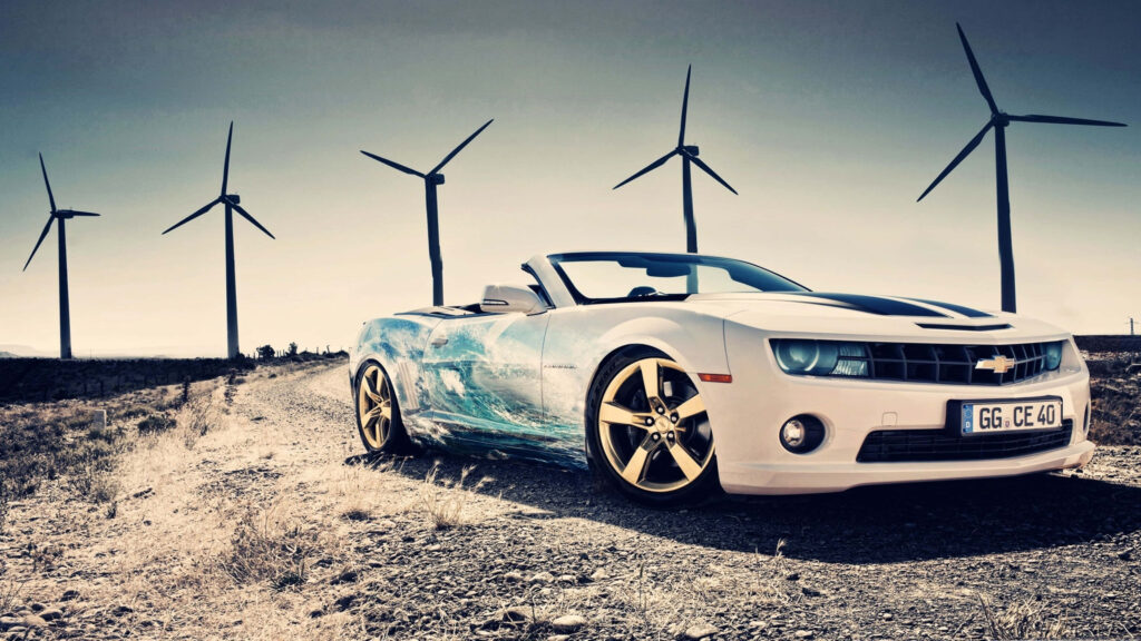 Chevrolet Camaro convertible blue white paint parked on dirt road with wind turbines background Wallpaper
