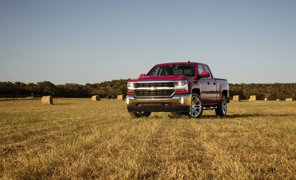 Chevrolet Silverado Double Cab in Scenic Rural Landscape Wallpaper