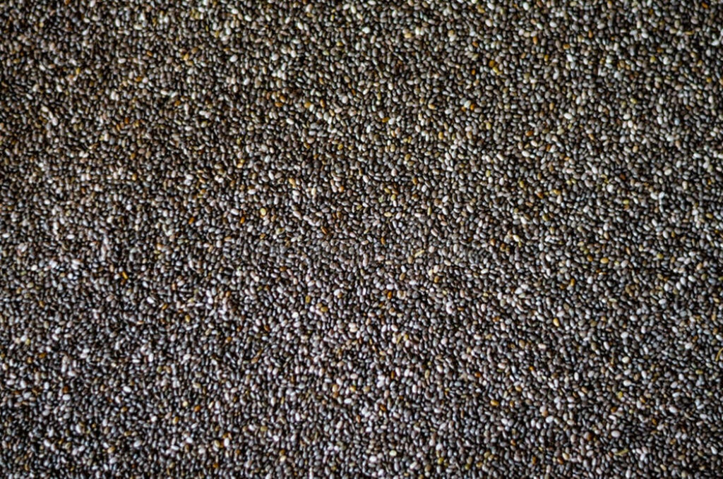 Chia Seeds Close-Up: Textured, Nutrient-Rich Wallpaper Background