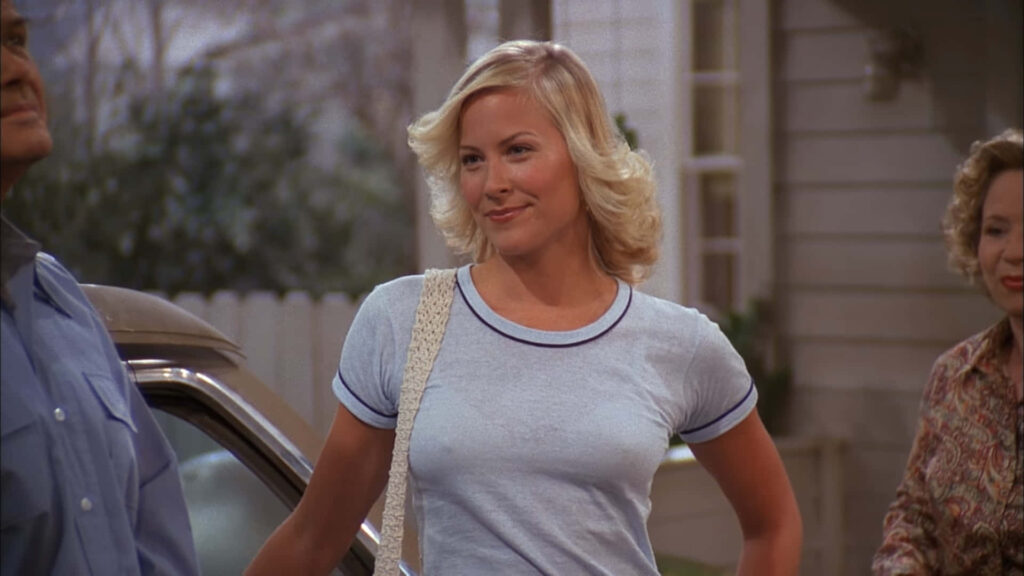 Brittany Daniel outdoors in light blue shirt blonde curls classic American style natural beauty wallpaper