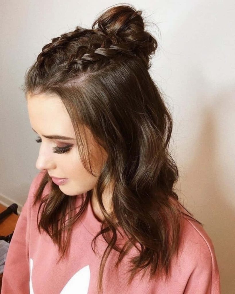 Brown hair half-up half-down Dutch braids messy top knot soft waves casual pink sweatshirt wallpaper
