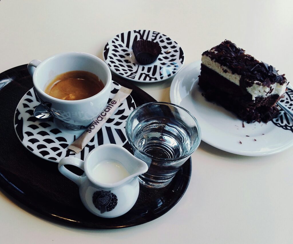 Chic Coffee Table Wallpaper: Espresso, Cake & Stylish Plates