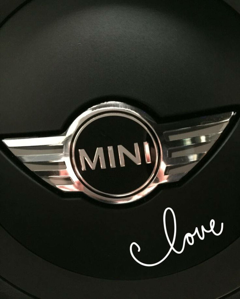 Mini Cooper Logo Wallpaper: Elegant Design with Love on Black Background