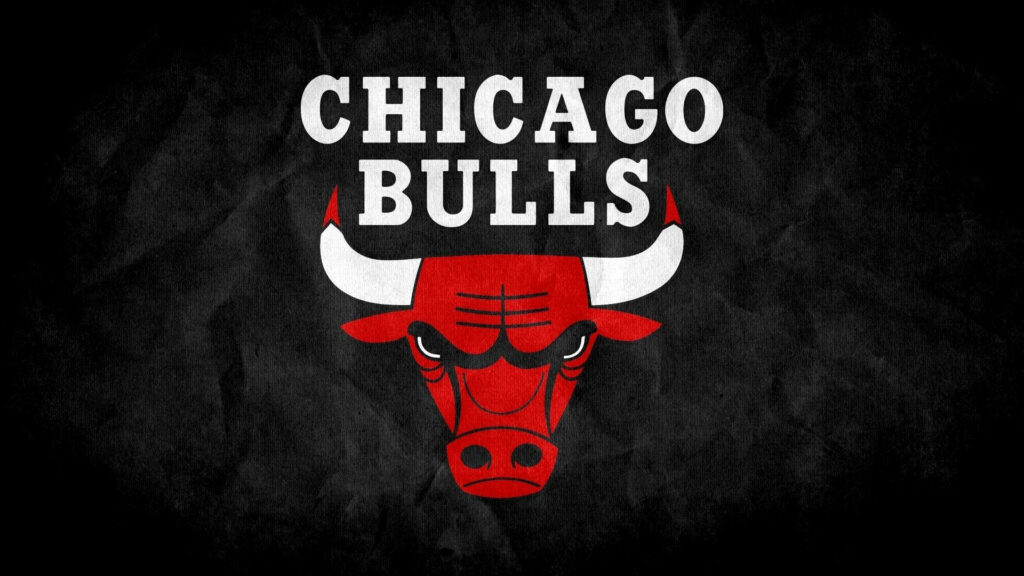 Chicago Bulls logo wallpaper with red bull head on textured black background and bold white text