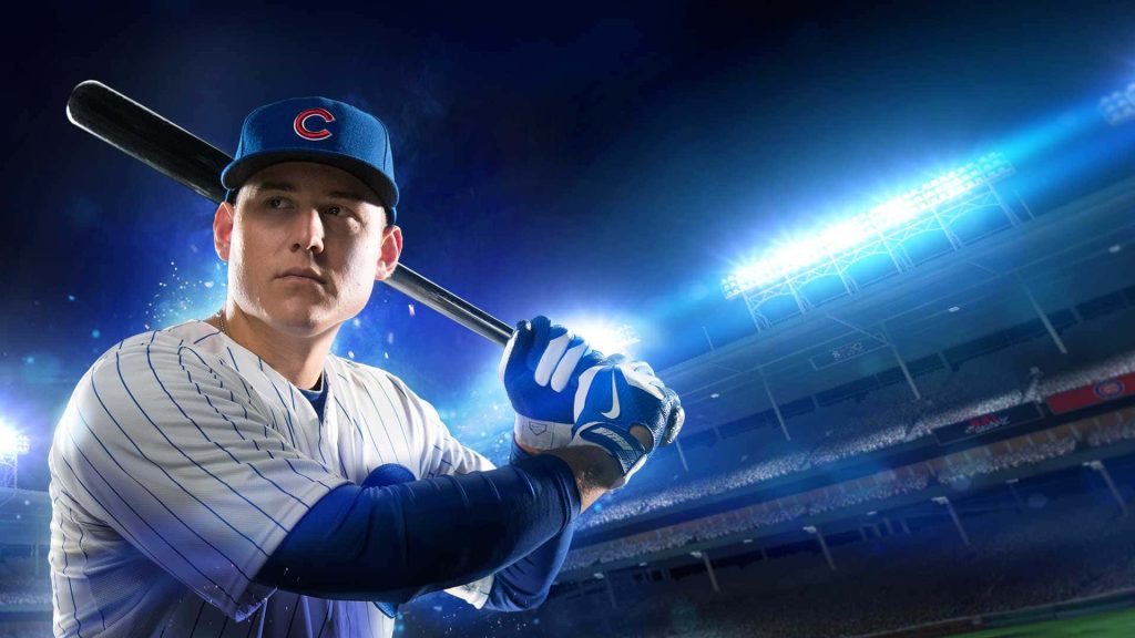 Chicago Cubs Anthony Rizzo batting stance night game wallpaper with dramatic stadium lighting