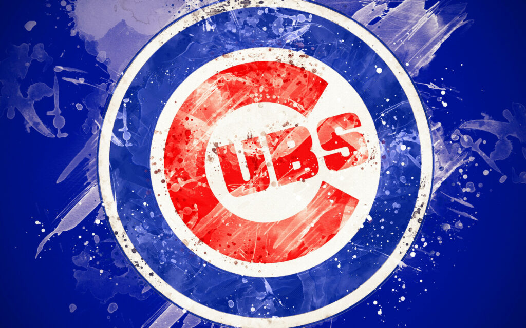 Chicago Cubs logo with dynamic red and blue splatter brushstroke on bold blue background wallpaper