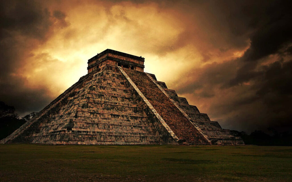 Chichen Itza Pyramid Wallpaper: Dramatic Orange Cloud Background