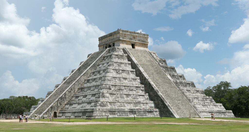 Chichen Itza Pyramid Wallpaper: Dramatic Sky & Architectural Grandeur