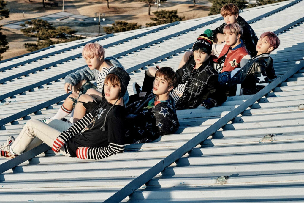 BTS's Rooftop Charm: A Cool Laptop Wallpaper Capturing the Beloved K-pop Group in an On-the-Edge Photoshoot