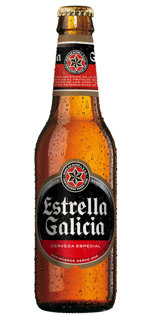 Close-up of chilled Estrella Galicia beer bottle with condensation on dark amber glass label Wallpaper