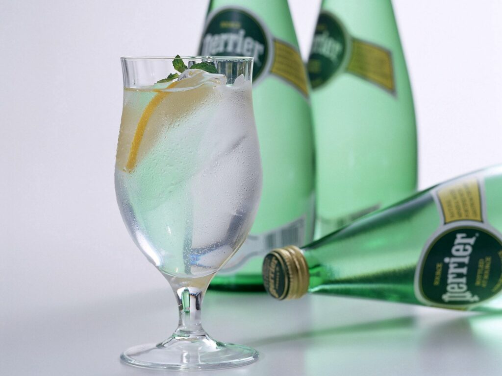 Refreshing Perrier Wallpaper: Chilled Water with Lemon & Mint