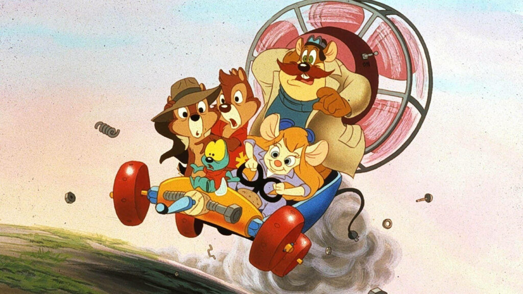 Chip N Dale Rescue Rangers soaring in a cart showing teamwork and adventurous spirit wallpaper