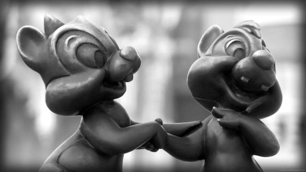 Black and white statue of Chip and Dale Rescue Rangers showing playful joyful friendship wallpaper