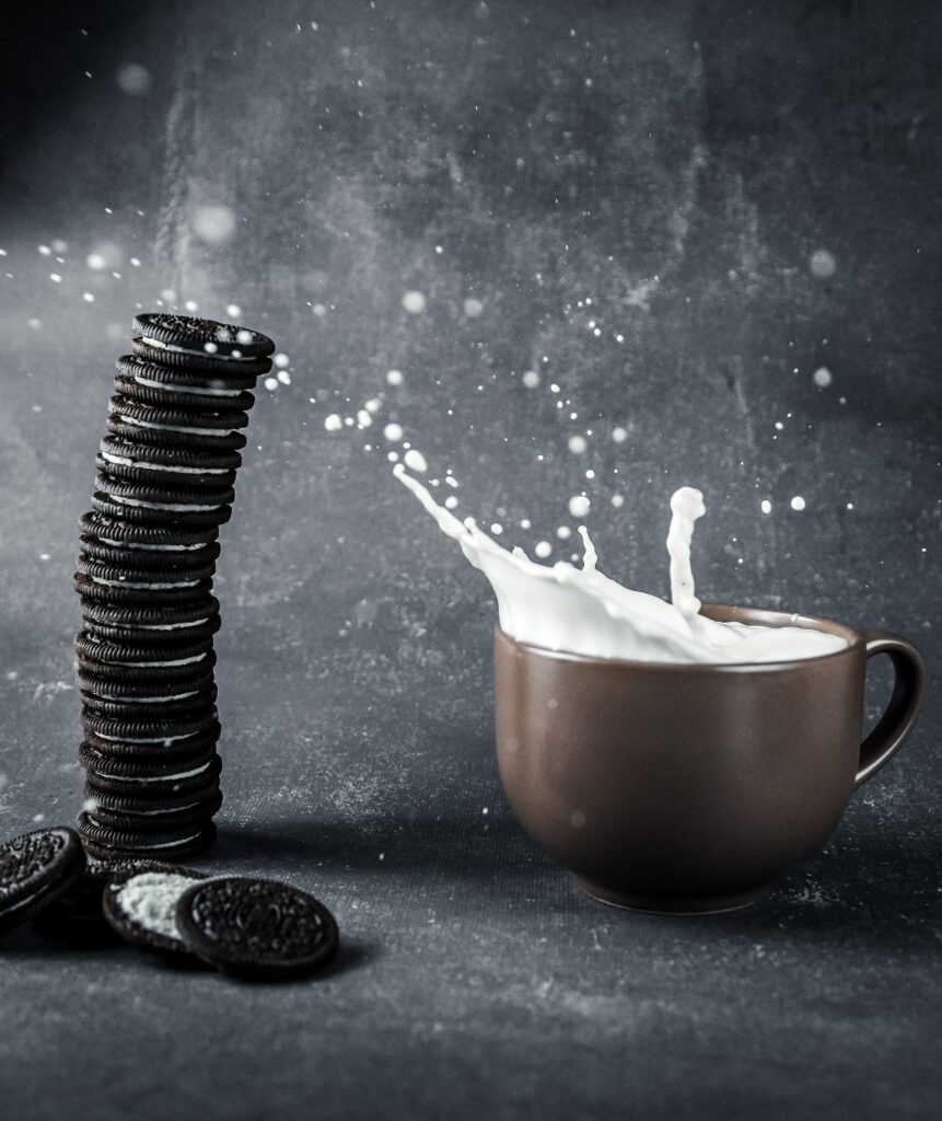 Chocolate Cookies & Milk Splash Wallpaper - Dark Textured Background