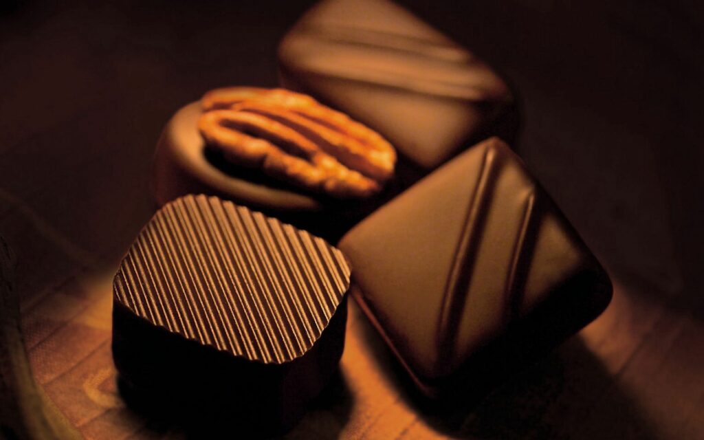 Decadent Chocolate Close-Up with Walnut: Luxe Wallpaper Background