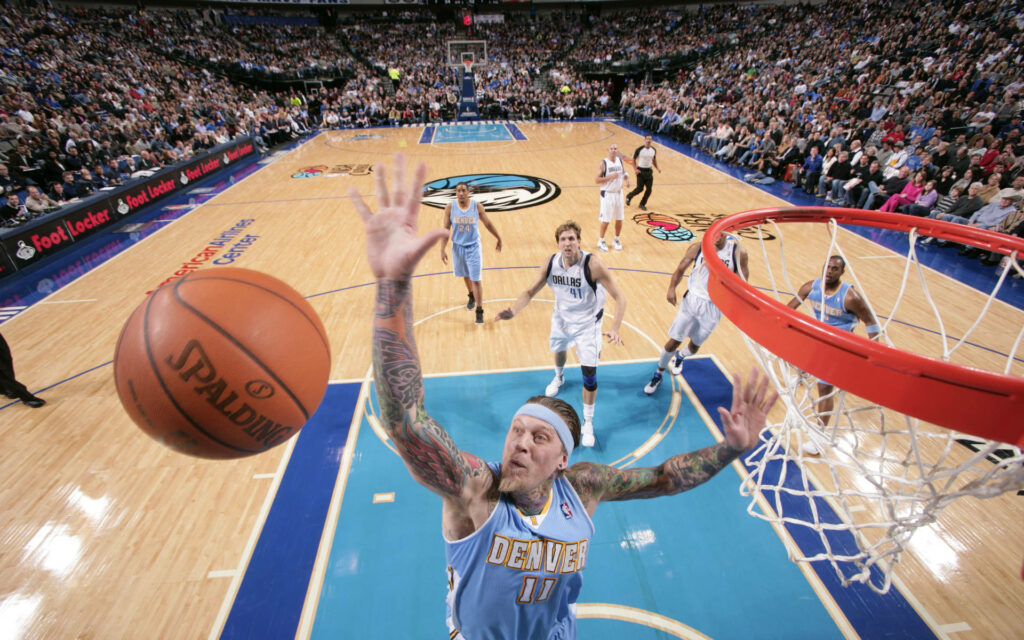 Chris Andersen mid-air layup Denver Nuggets NBA game colorful tattoos vibrant court arena wallpaper