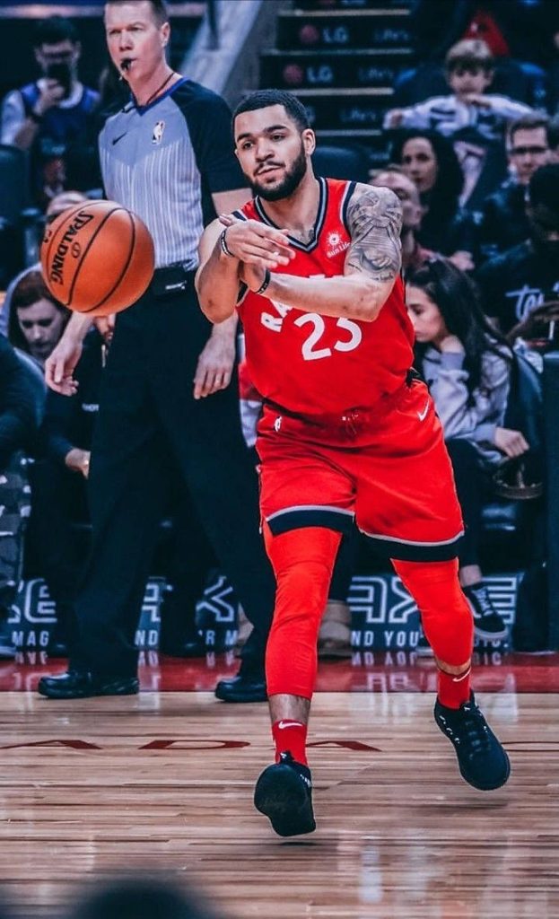 Chris Boucher Toronto Raptors game action shot red jersey flying basketball NBA intense play Wallpaper