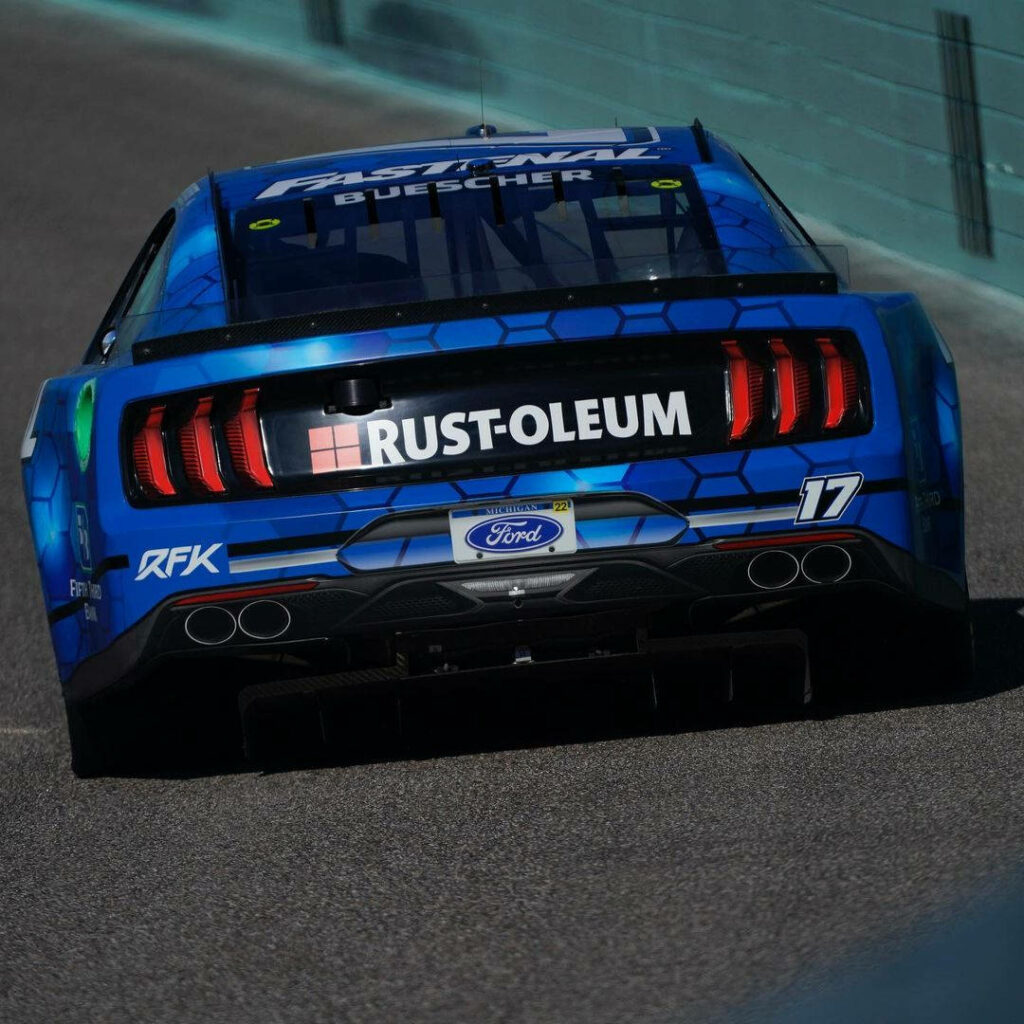 Chris Buescher No 17 Ford Mustang race car blue Rust-Oleum sponsor rear view speeding wallpaper
