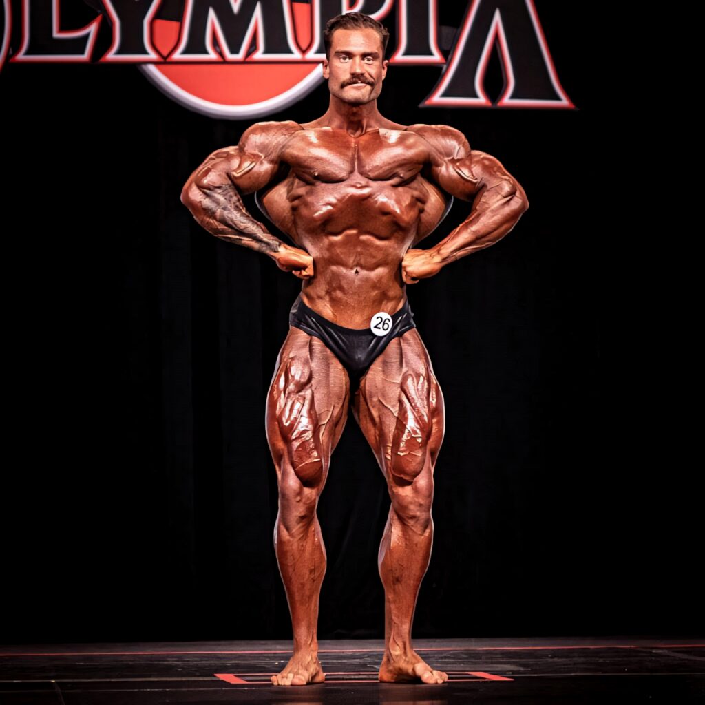Chris Bumstead front lat spread muscle definition classic bodybuilding Olympia stage wallpaper