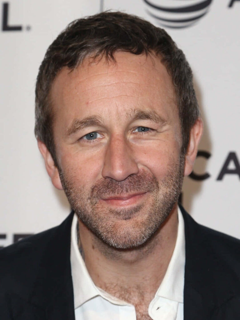 Chris O'Dowd close-up portrait with warm smile soft lighting blurred neutral background wallpaper