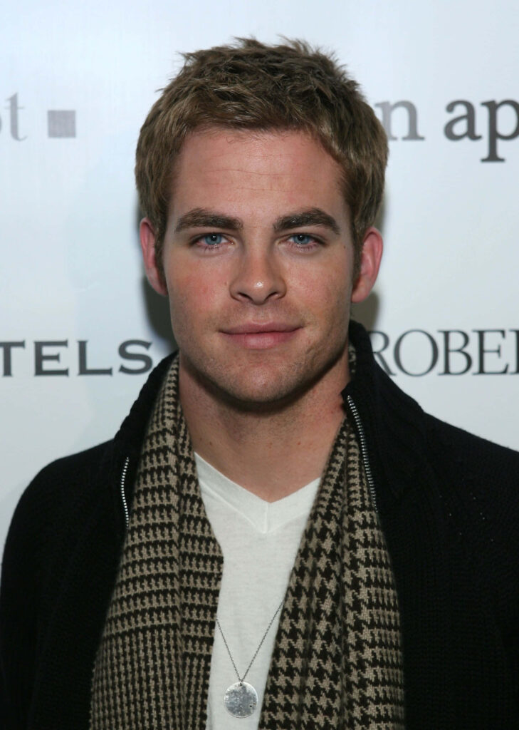 Chris Pine portrait with dark jacket patterned scarf white shirt sharp blue eyes light brown hair Wallpaper