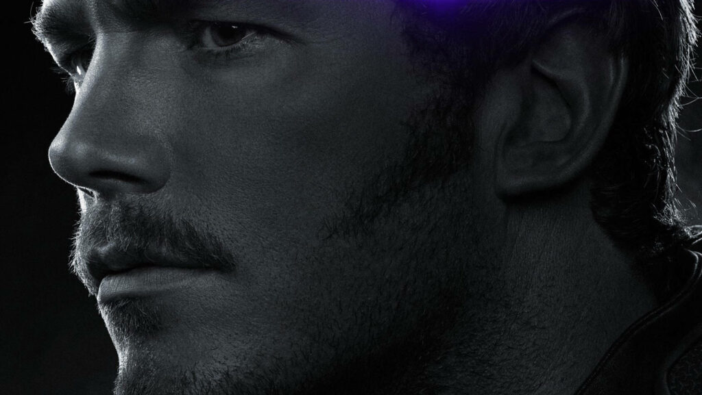 Close-up portrait of Chris Pratt in monochrome with dramatic lighting and cinematic texture wallpaper