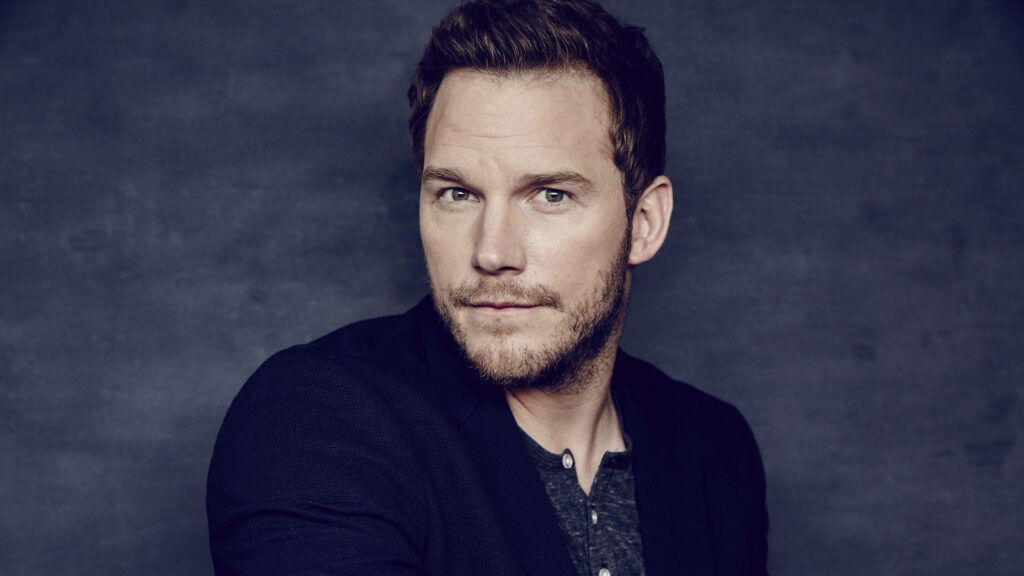 Chris Pratt portrait wallpaper dark textured background soft lighting charismatic actor expressions