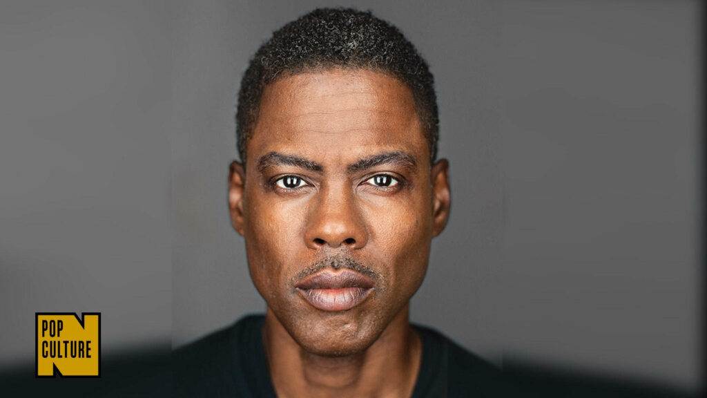 Chris Rock portrait wallpaper gray background expressive face bold modern pop culture logo