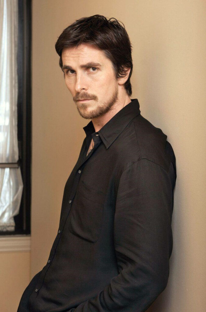 Christian Bale portrait wallpaper intense gaze stylish look neutral background high quality image