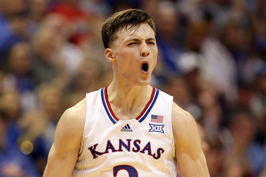 Christian Braun Kansas basketball player celebrating intensity and passion in action wallpaper