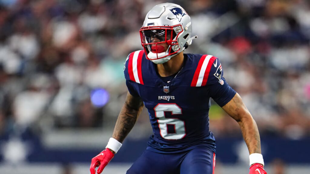 Christian Gonzalez in New England Patriots uniform ready for play high-definition football wallpaper