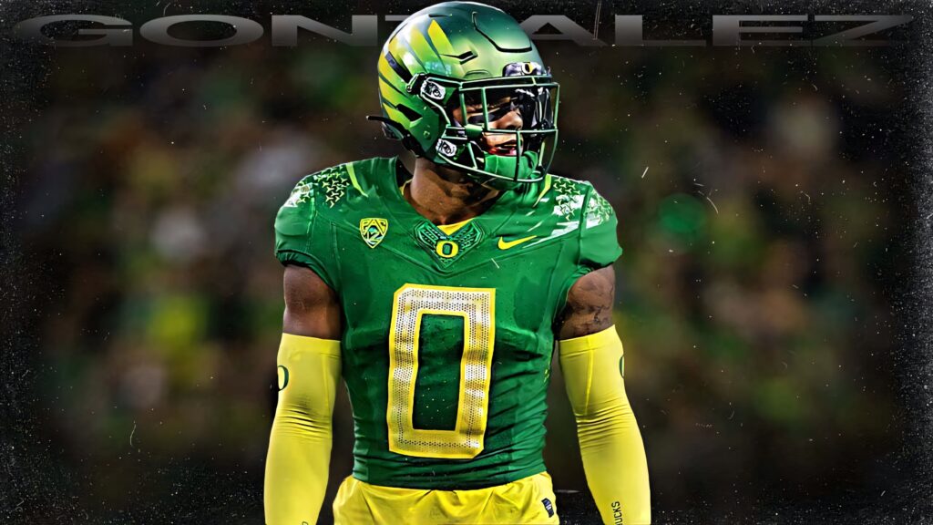 Christian Gonzalez in vivid Oregon Ducks uniform intense game moment high definition sports wallpaper